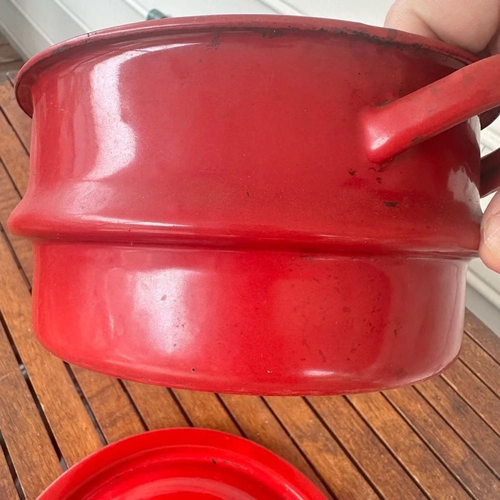 Red enamel pot with lid